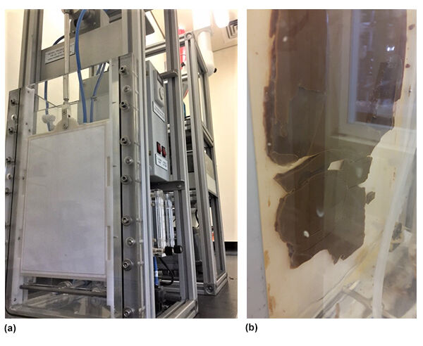 Figure 1 (a) The single-channel bench-scale plant. (b) A clogged membrane channel