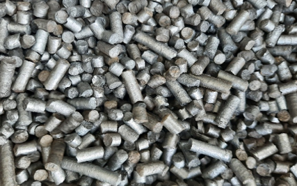 Thin cylinders of sludge (pelleted, pyrolysed sewage sludge)