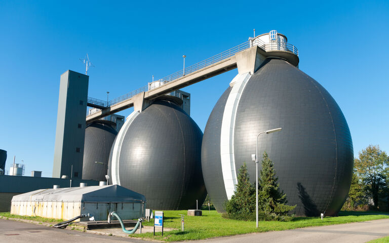 An image of three egg-shaped reactors used for the anaerobic digestion of sewage sludge